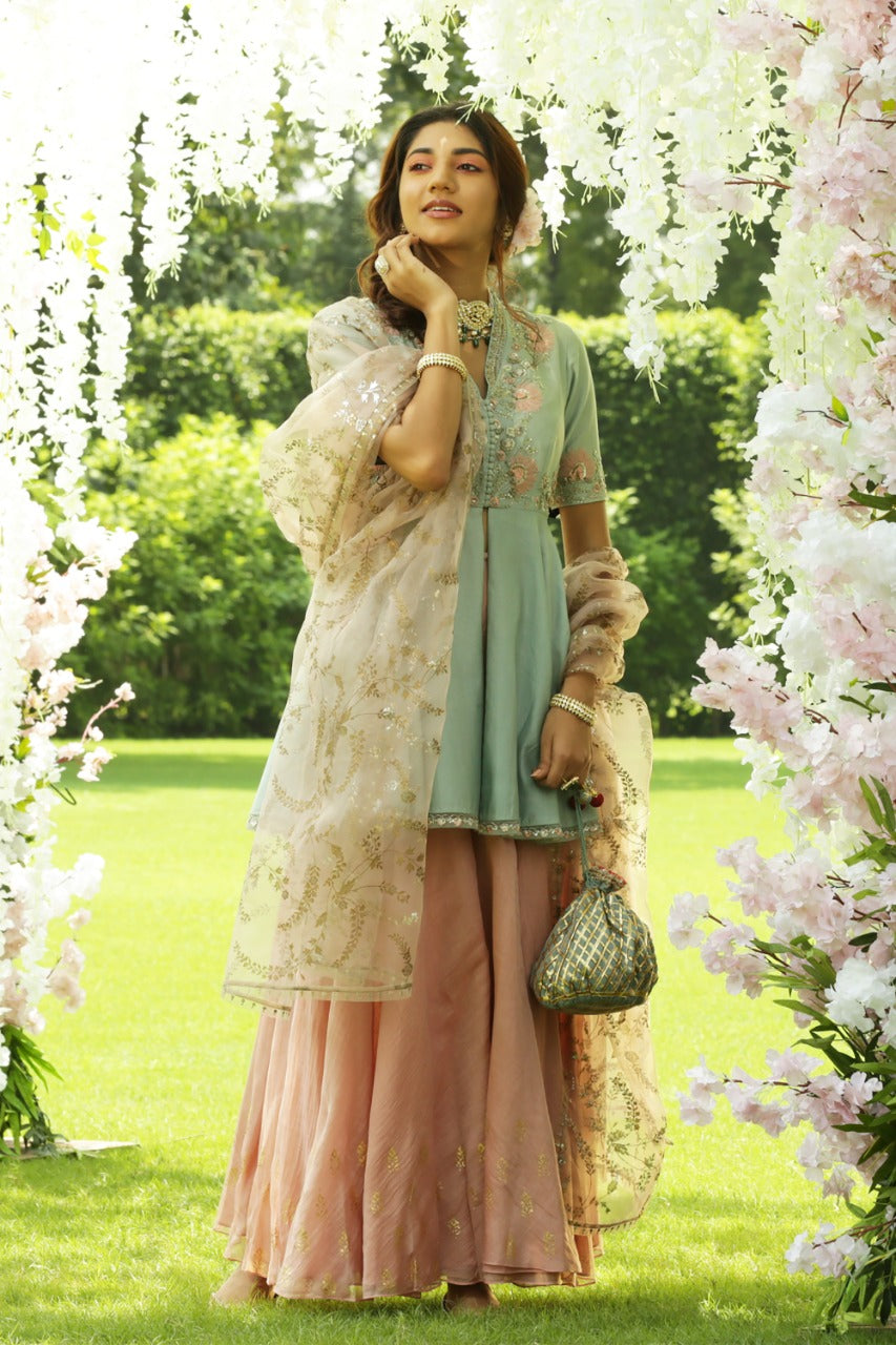 Classy Aqua Embroidered Peplum Kurta Set.